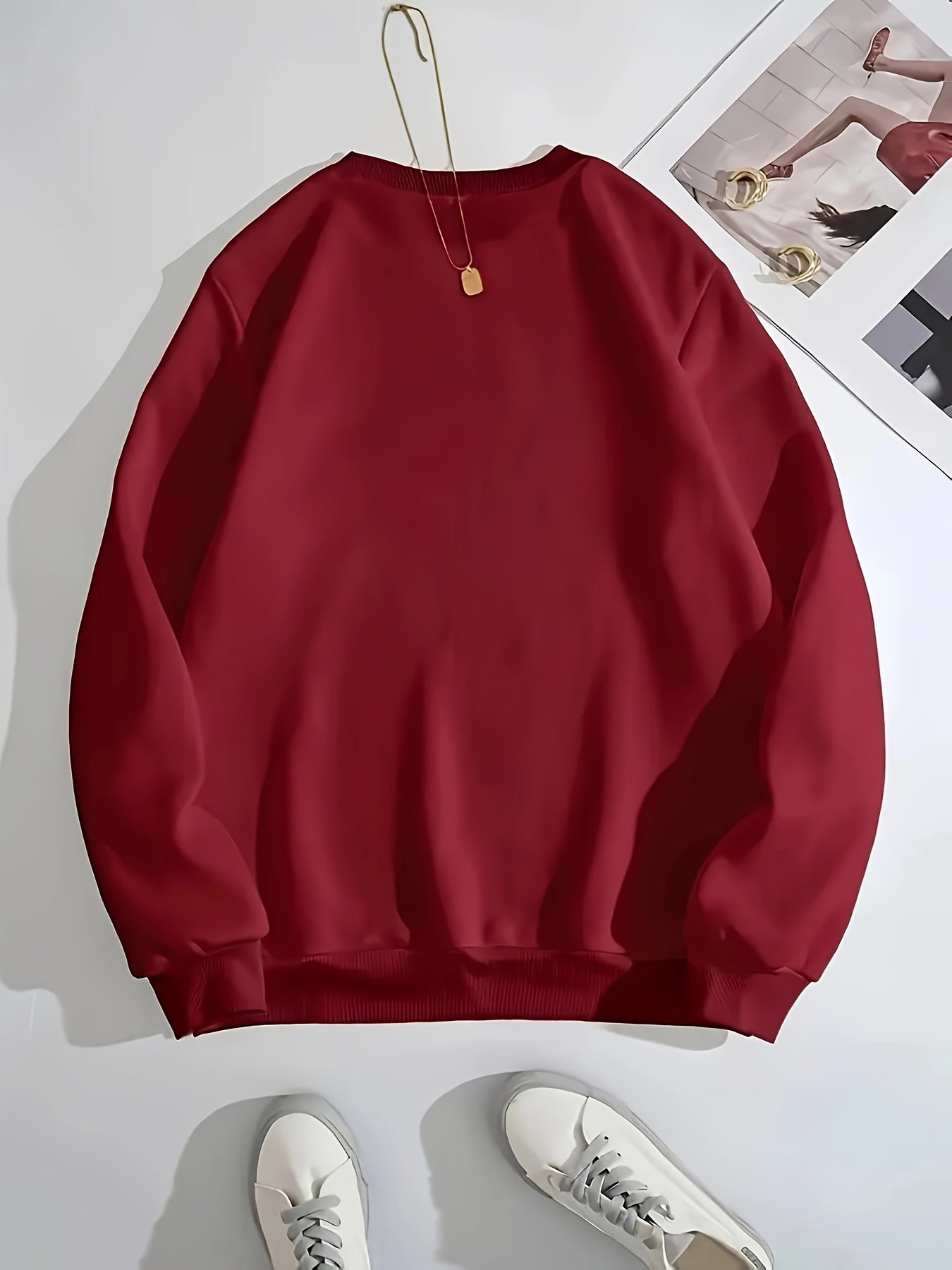A Casual Sports Sweatshirt With A Simple Panda Print For Women With Long Sleeves And A Round Neck.